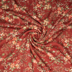 Viscose-twill med små blomster i rød, gul, grøn og fersken på brændt rød baggrund