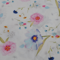 Bomuldsjersey med pastelfarvede blomster i forskellige størrelser på hvid baggrund