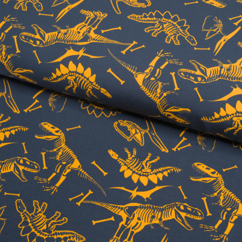 Bomuldsjersey med dinosaurskeletter i orange på mørkeblå baggrund
