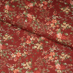 Viscose-twill med små blomster på brændt orange baggrund